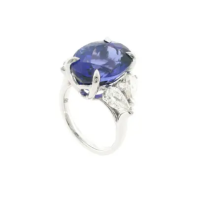 Exclusive ring with natural 13.35 ct tanzanite and diamonds in white gold
