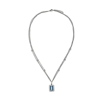 Sparkling Aquamarine Surrounded by Diamonds in Luxury Jewellery