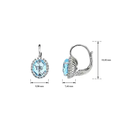 Hanging Earrings Decorated with Blue Topaz on Elegant White Gold