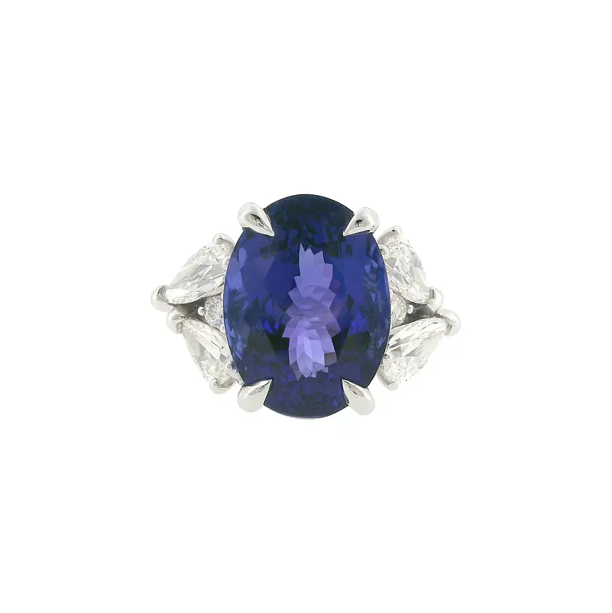 Exclusive ring with natural 13.35 ct tanzanite and diamonds in white gold