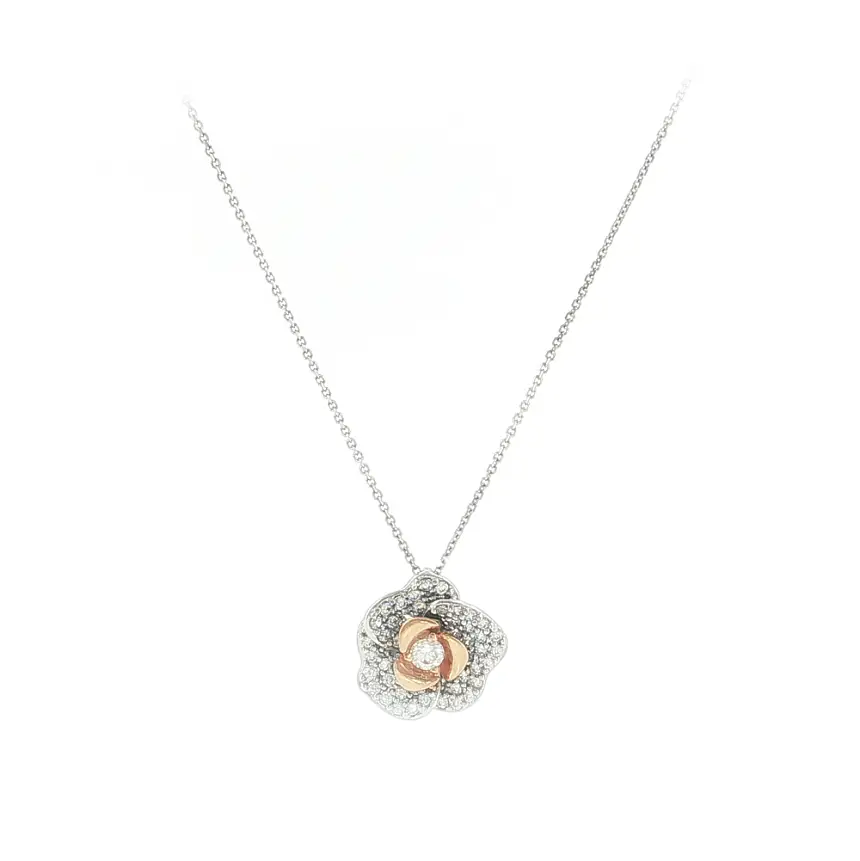 Elegant white gold necklace with a flower pendant and zirconia