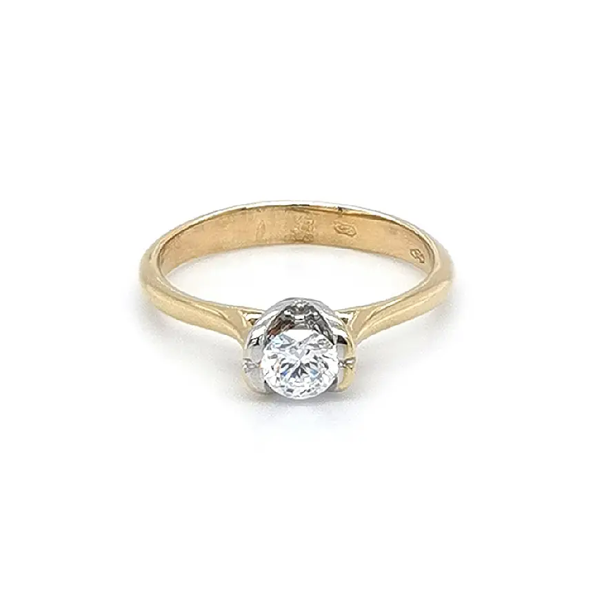 Engagement Ring with Zircon made of Combined Gold