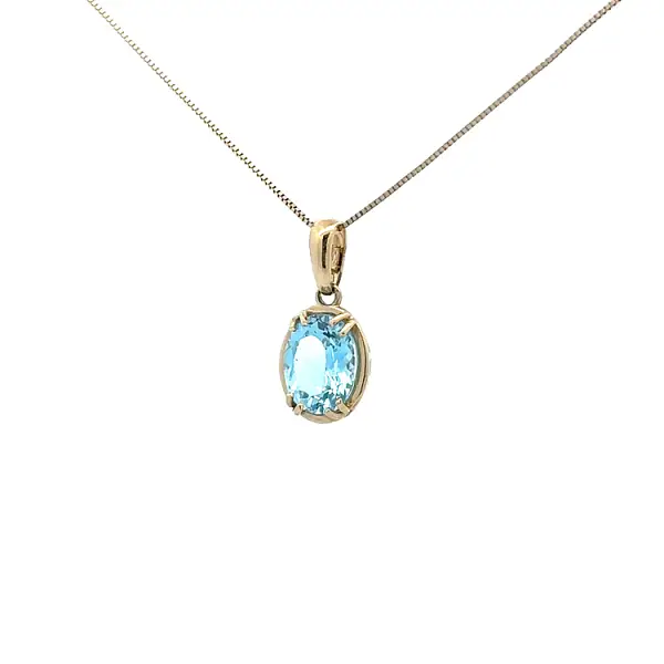 Exclusive Gold Pendant with Blue Topaz