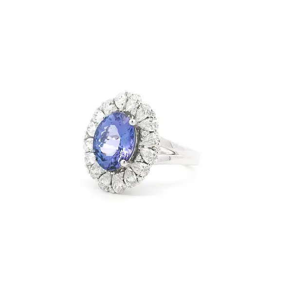 White Gold Ring with Tanzanite and Diamond Halo