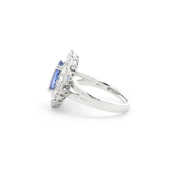 White Gold Ring with Tanzanite and Diamond Halo