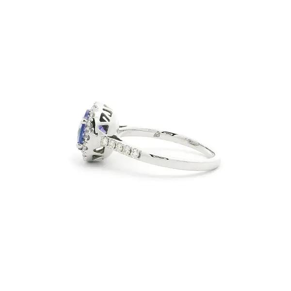White Gold Ring with Tanzanite and Diamond Halo