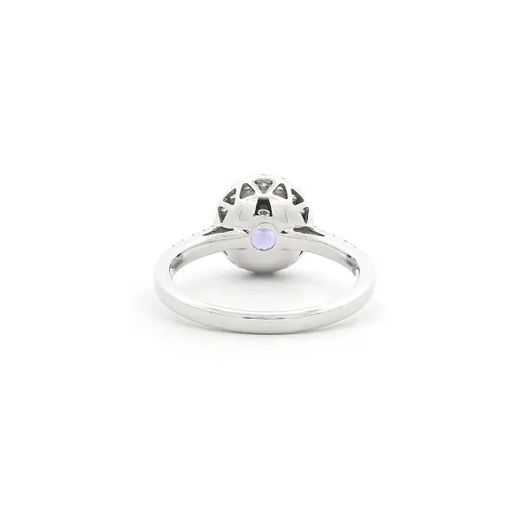 White Gold Ring with Tanzanite and Diamond Halo