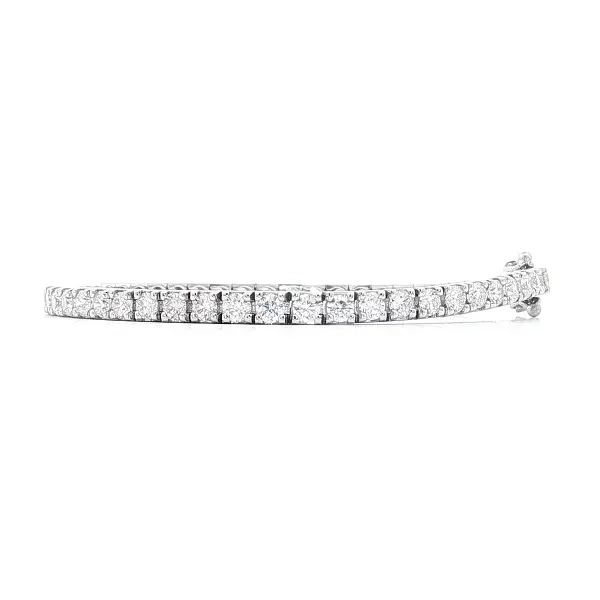 Gold tennis bracelet with diamonds