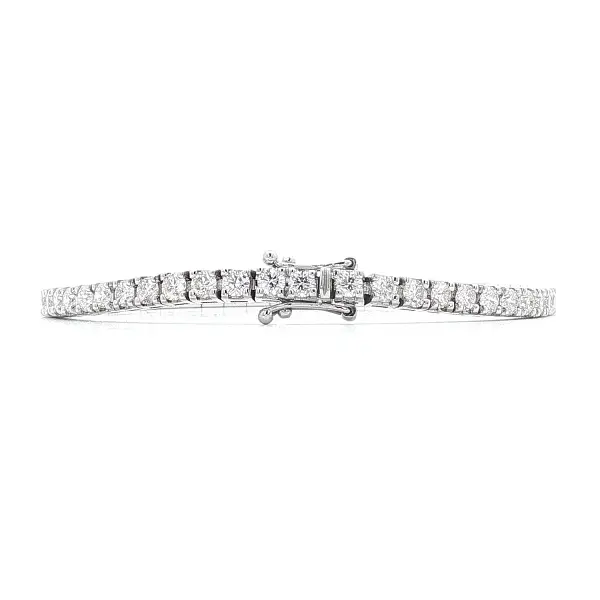 Gold tennis bracelet with diamonds