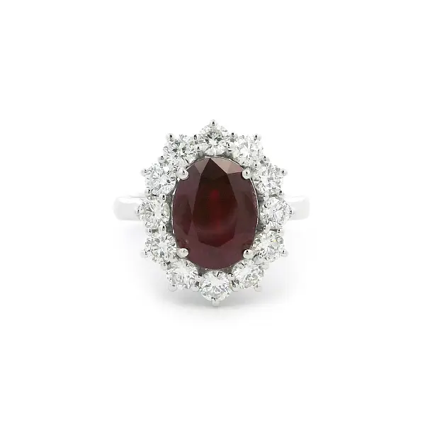White Gold Ring with Oval Ruby and Diamond Halo