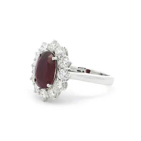White Gold Ring with Oval Ruby and Diamond Halo