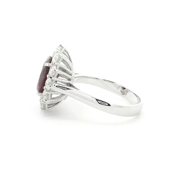 White Gold Ring with Oval Ruby and Diamond Halo