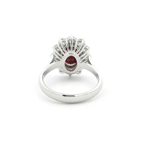 White Gold Ring with Oval Ruby and Diamond Halo