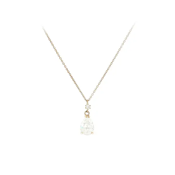 Delicate gold necklace with a teardrop zircon