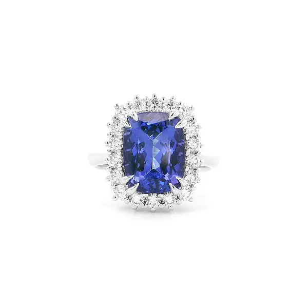 Luxury Ring with Tanzanite Surrounded by Diamonds in White Gold