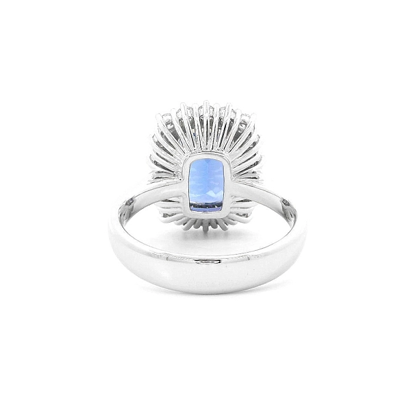 Luxury Ring with Tanzanite Surrounded by Diamonds in White Gold
