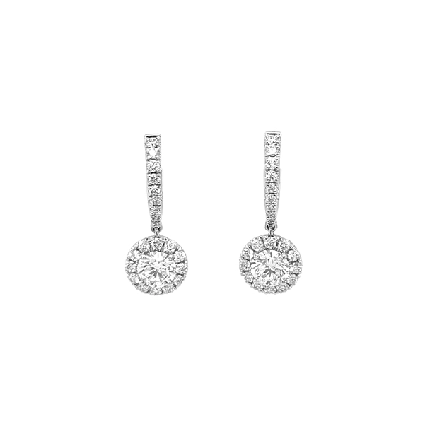 Gold dangle earrings with diamonds