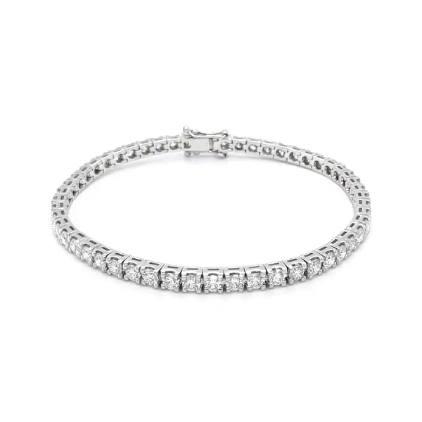 Gold tennis bracelet with diamonds