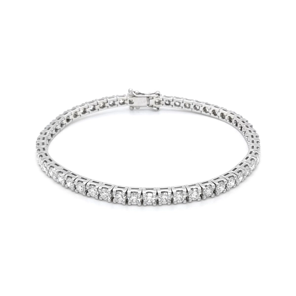 Gold tennis bracelet with diamonds