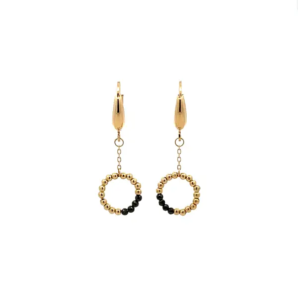 Gold dangle earrings with black stones