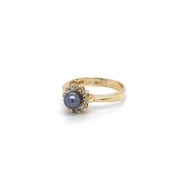 Gold Ring with Black Pearl and Zircons