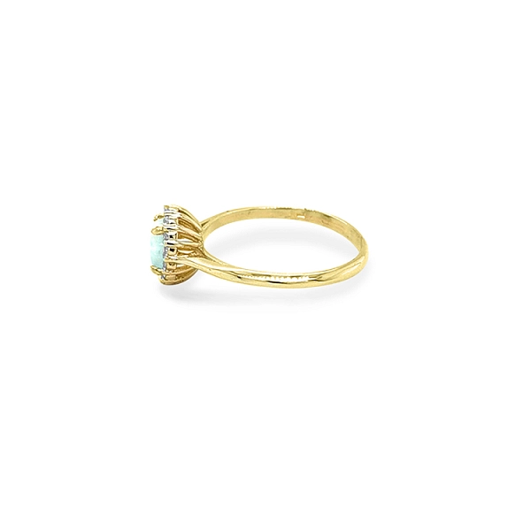 Gold Ring with Opal and Zircones