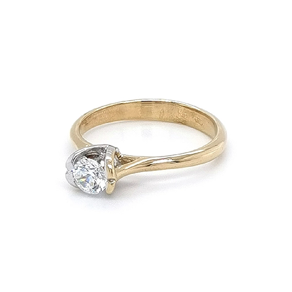 Engagement Ring with Zircon made of Combined Gold