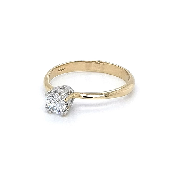 Engagement Ring with Zircon made of Combined Gold