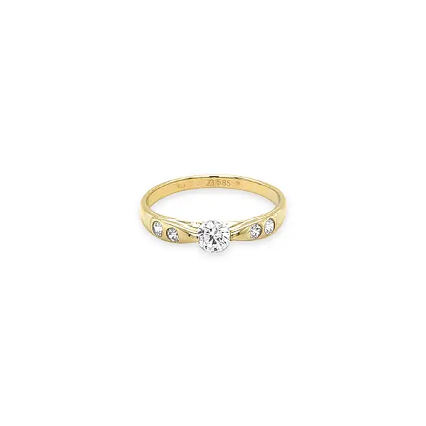 Gold engagement ring with cubic zirconia