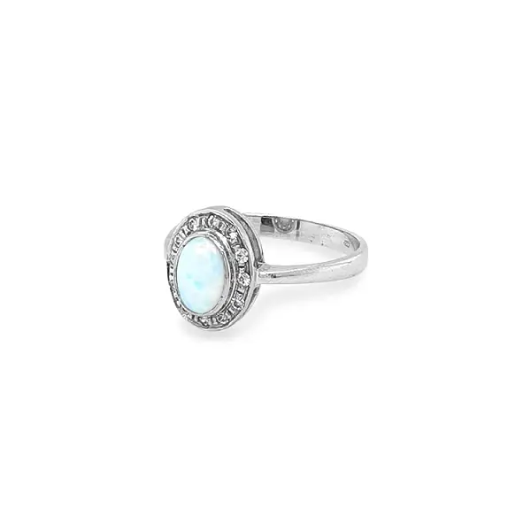 Gold Ring with Opal and Zircones
