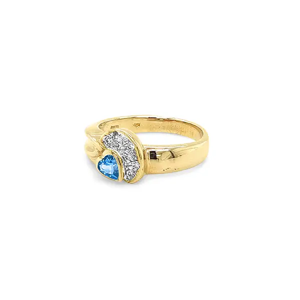 Exclusive Gold Ring with Heart-Shaped Blue Topaz and Zirconia