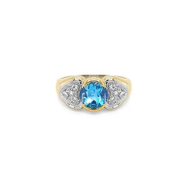Exclusive Gold Ring with Blue Topaz and Zirconia