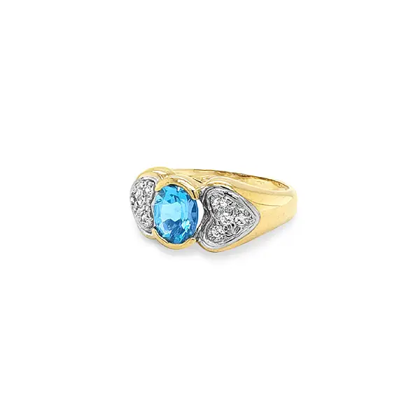 Exclusive Gold Ring with Blue Topaz and Zirconia