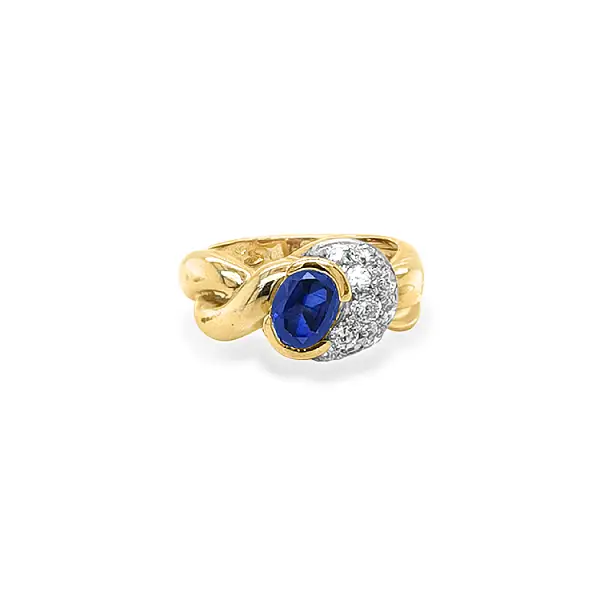 Exclusive Gold Ring with Sapphire and Zirconia