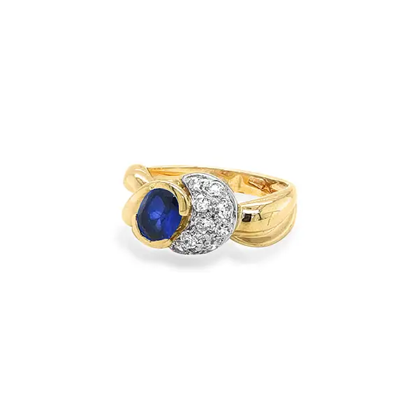 Exclusive Gold Ring with Sapphire and Zirconia