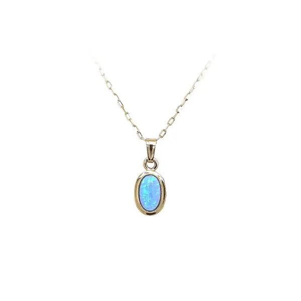 Gold Pendant with Blue Stone
