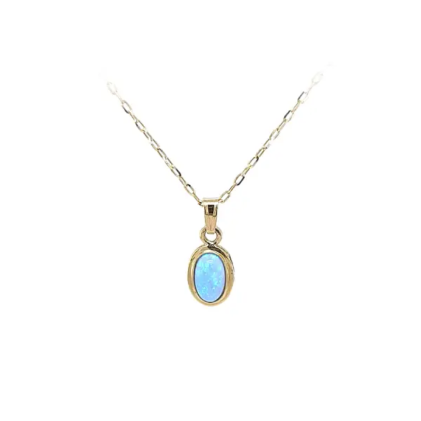 Gold Pendant with Blue Stone