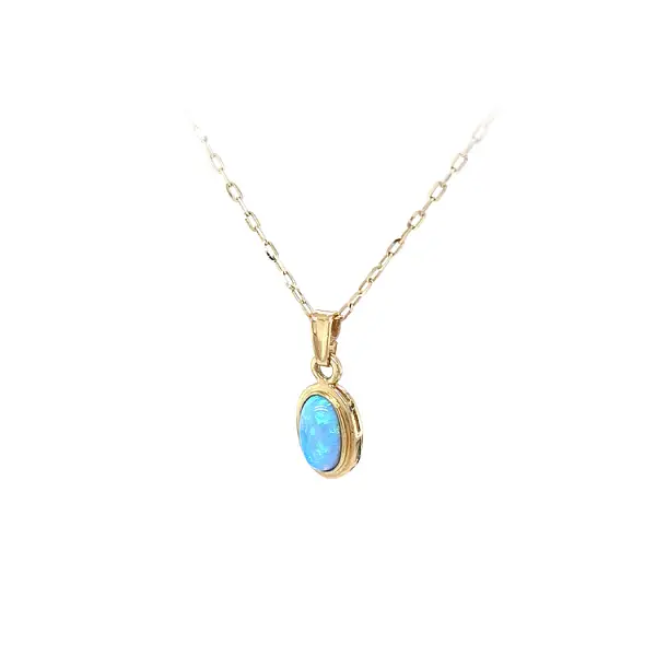 Gold Pendant with Blue Stone