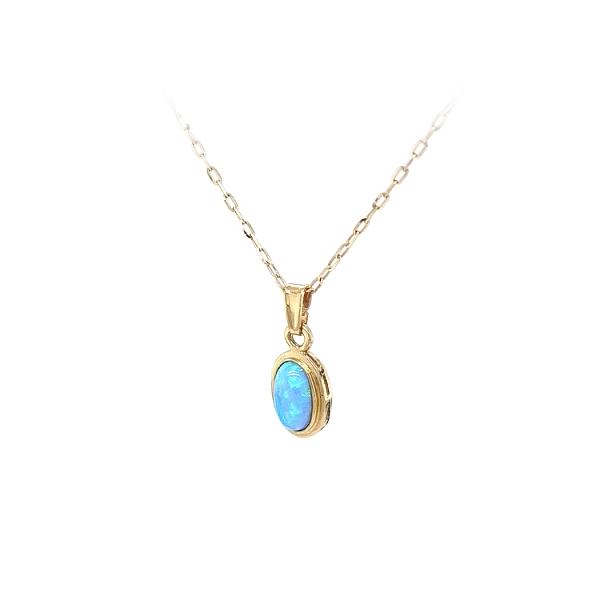 Gold Pendant with Blue Stone