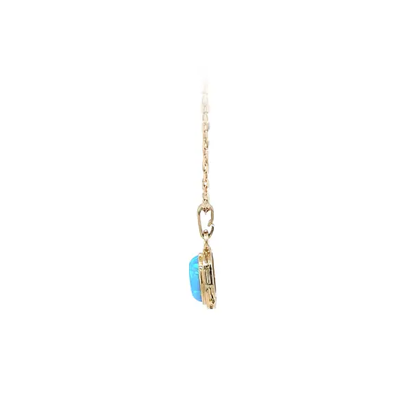 Gold Pendant with Blue Stone