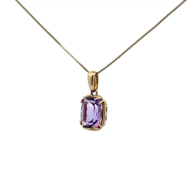 Gold Pendant with Purple Stone