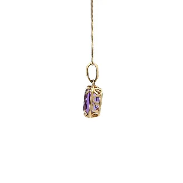 Gold Pendant with Purple Stone
