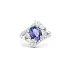 Luxury White Gold Ring with Oval Tanzanite and Pear-Shaped Diamonds