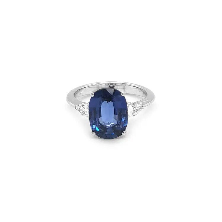 Gold engagement ring with sapphire and diamonds