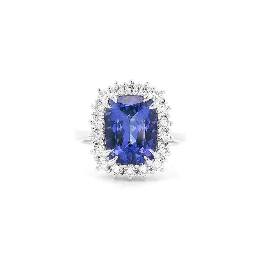 Luxury Ring with Tanzanite Surrounded by Diamonds in White Gold