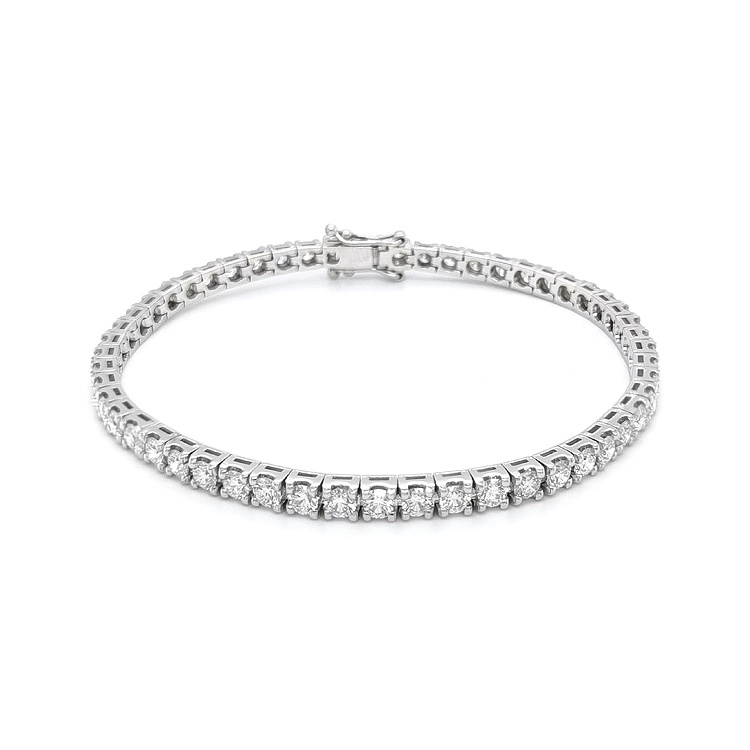 Gold tennis bracelet with diamonds