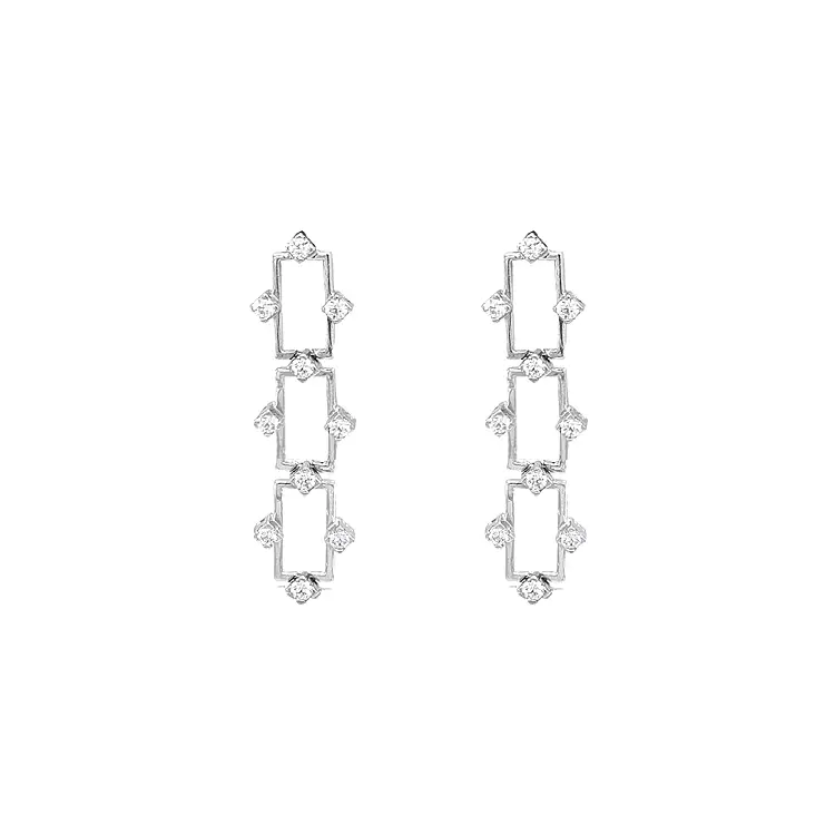 Gold dangle earrings with Zircons