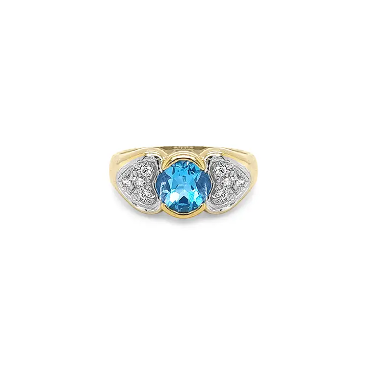 Exclusive Gold Ring with Blue Topaz and Zirconia