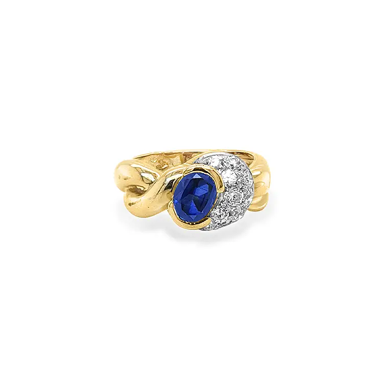 Exclusive Gold Ring with Sapphire and Zirconia