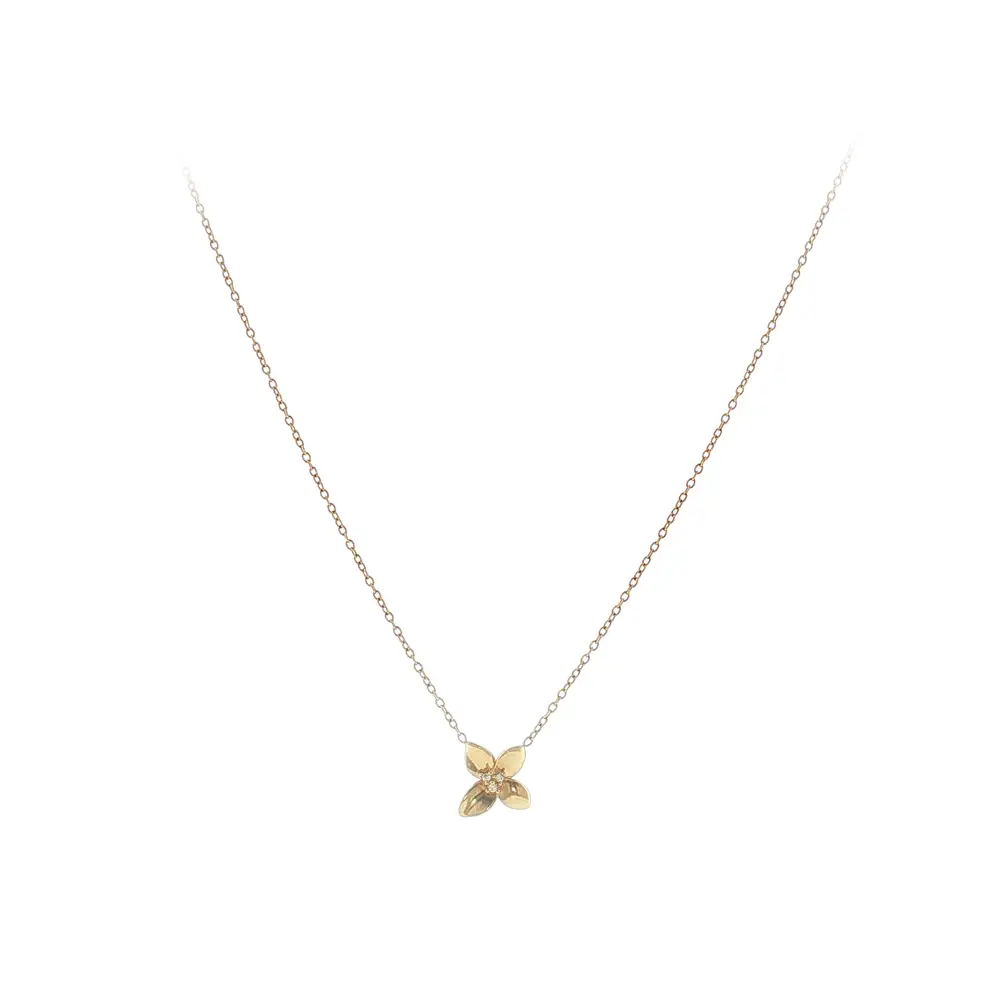Elegant gold necklace with a flower pendant and zirconia
